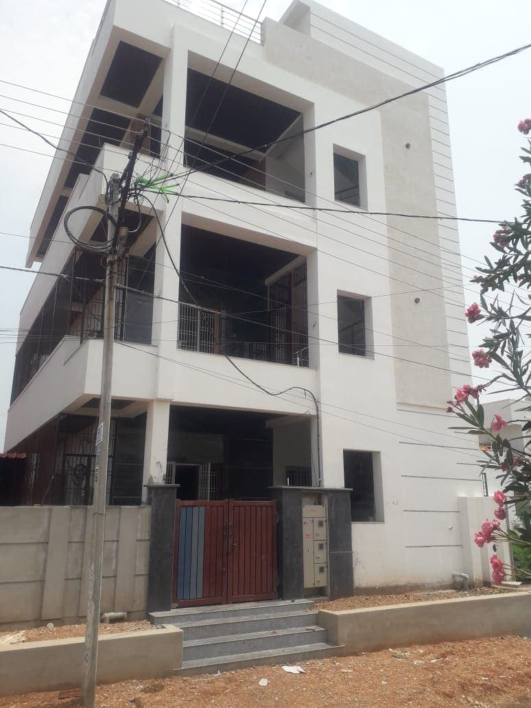 Off-White Elevation, a residential project (G+3) by ASRG Construction in Kurnool